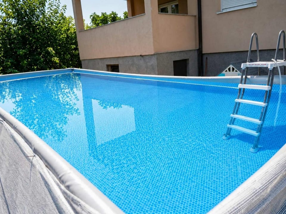 Swimming pool, sunbed