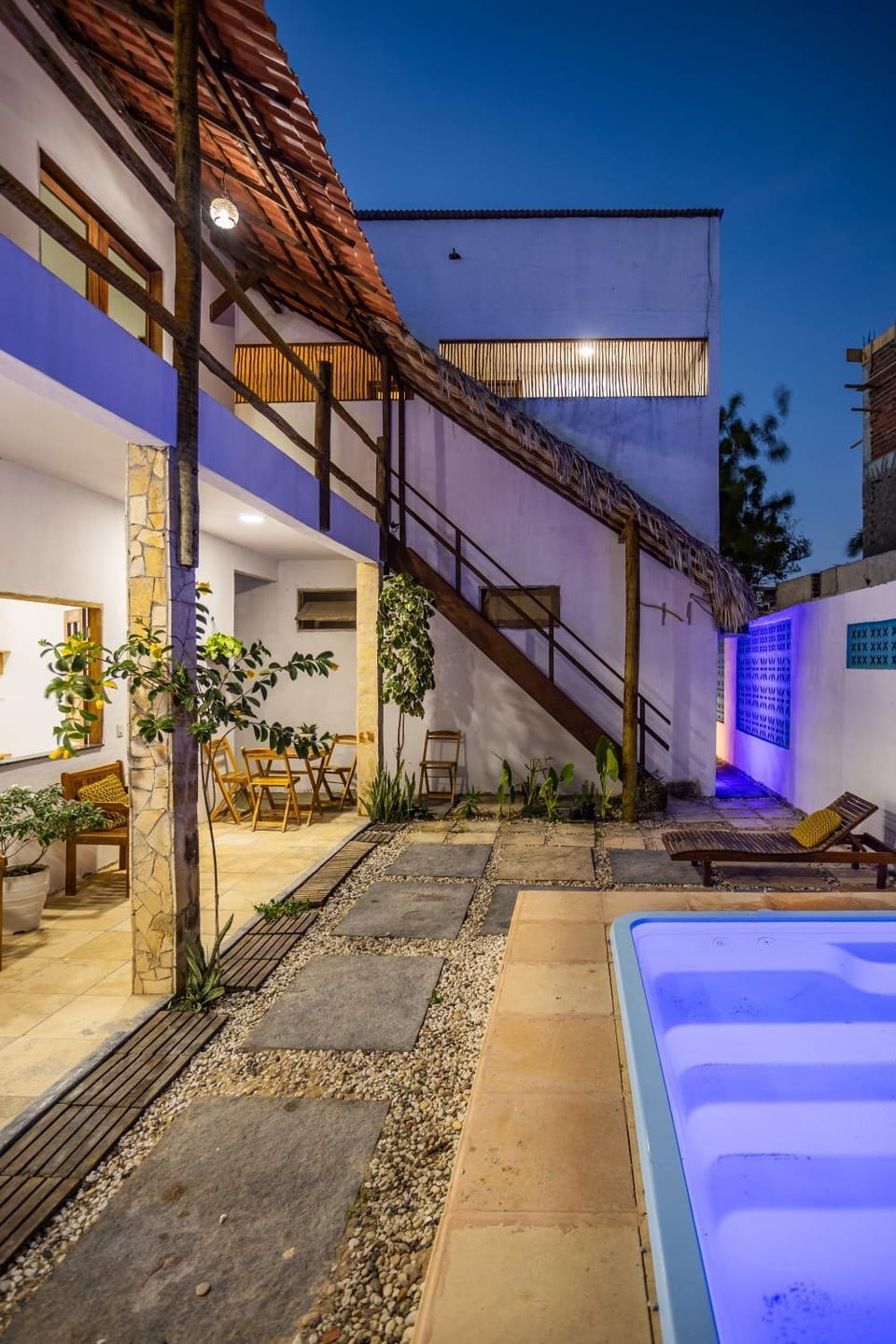 Property building, Patio, Night, Pool view, Swimming pool