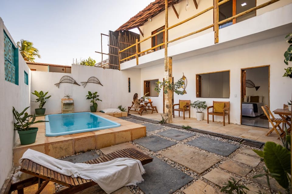 Property building, Patio, Day, View (from property/room), Pool view, Swimming pool, sunbed