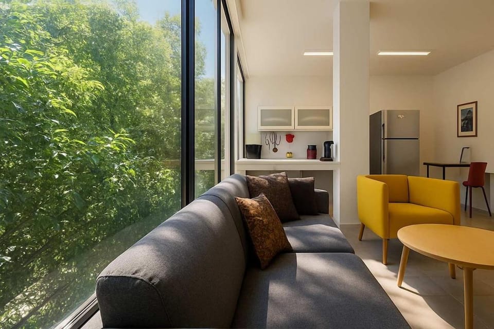 Kitchen or kitchenette, Living room, Seating area, Dining area