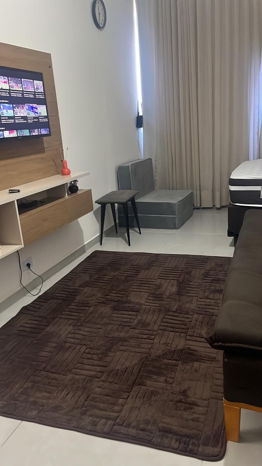 Bed, TV and multimedia, Living room, Photo of the whole room, Seating area, Bedroom