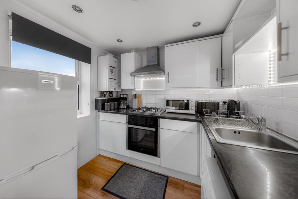 Kitchen or kitchenette, dishwasher, oven, pet friendly, stove, toaster