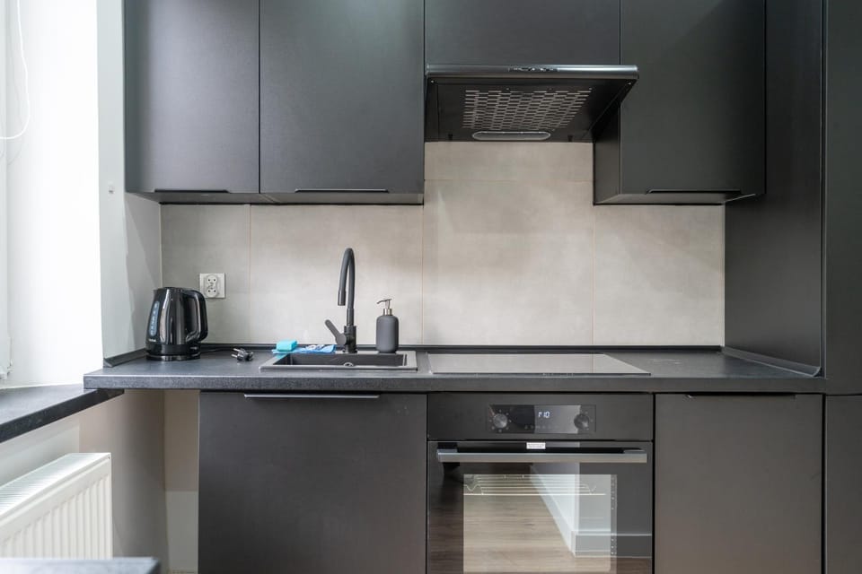 Kitchen or kitchenette, oven, stove