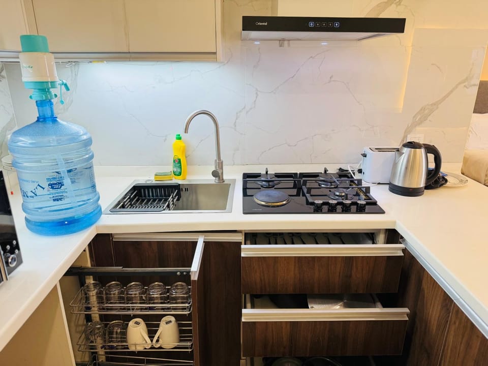 Kitchen or kitchenette, stove, toaster