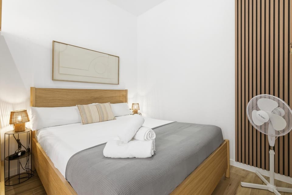 Bed, Photo of the whole room, Bedroom, towels, air conditioner