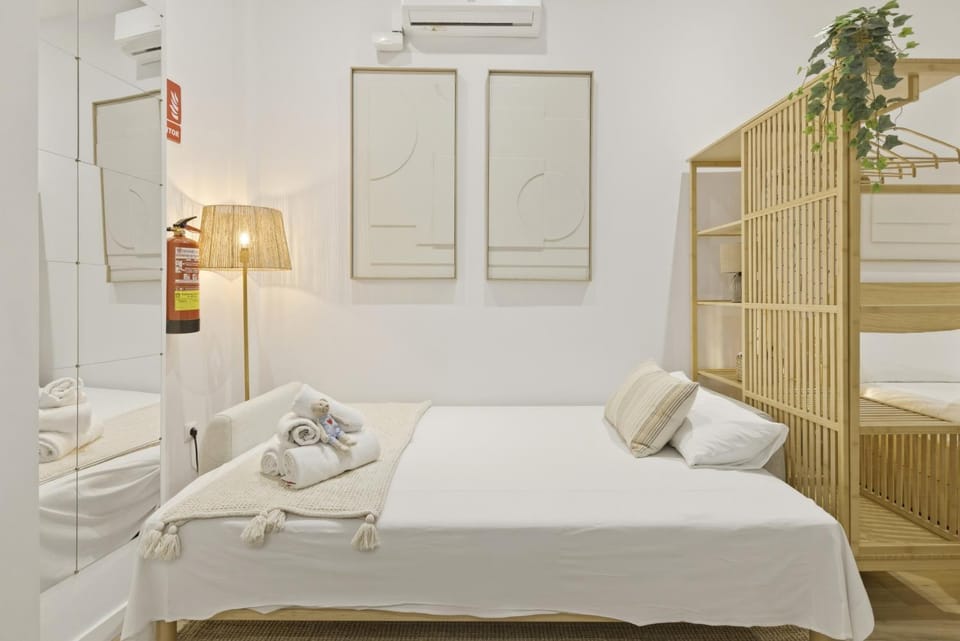 Bed, Photo of the whole room, Bedroom, towels, air conditioner