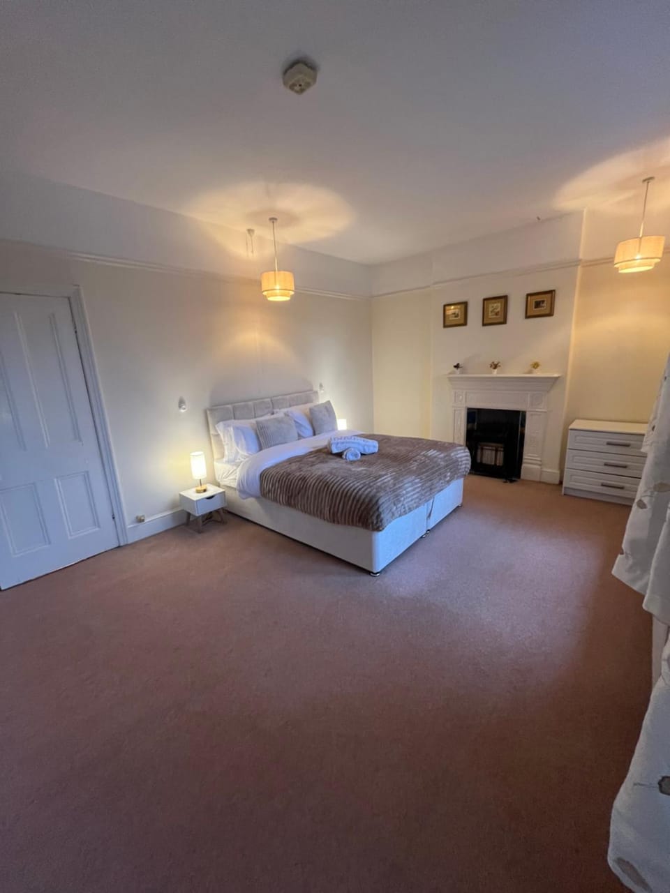 Bed, Photo of the whole room, Bedroom, flat iron, hair dryier, towels, wardrobe