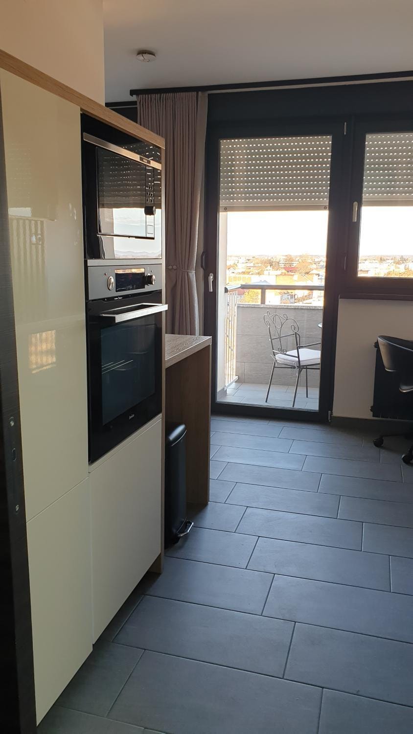 Kitchen or kitchenette, microwave, oven