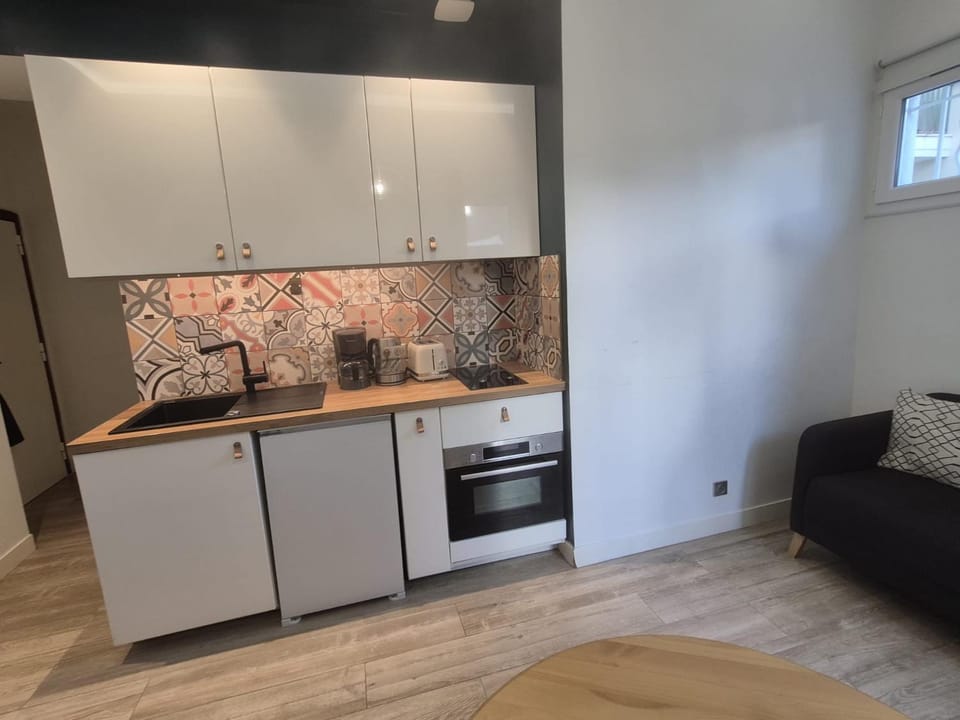 Kitchen or kitchenette, stove
