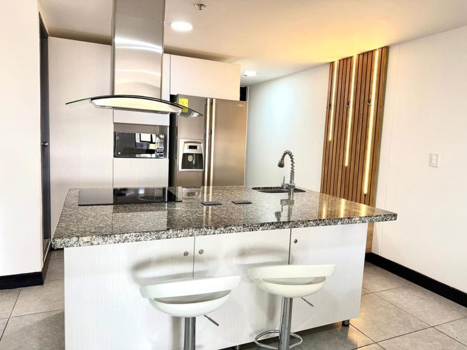 Kitchen or kitchenette, stove