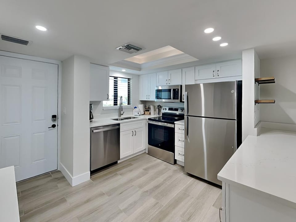 Kitchen or kitchenette, microwave, oven, kitchen, air conditioner