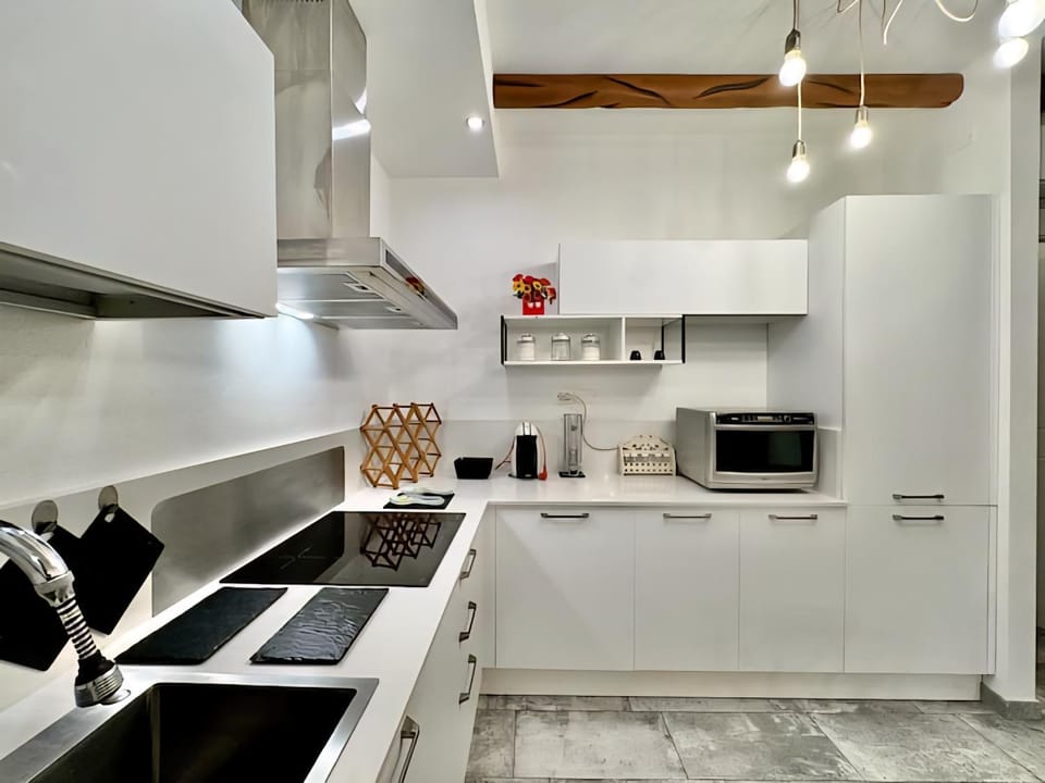 Kitchen or kitchenette, stove