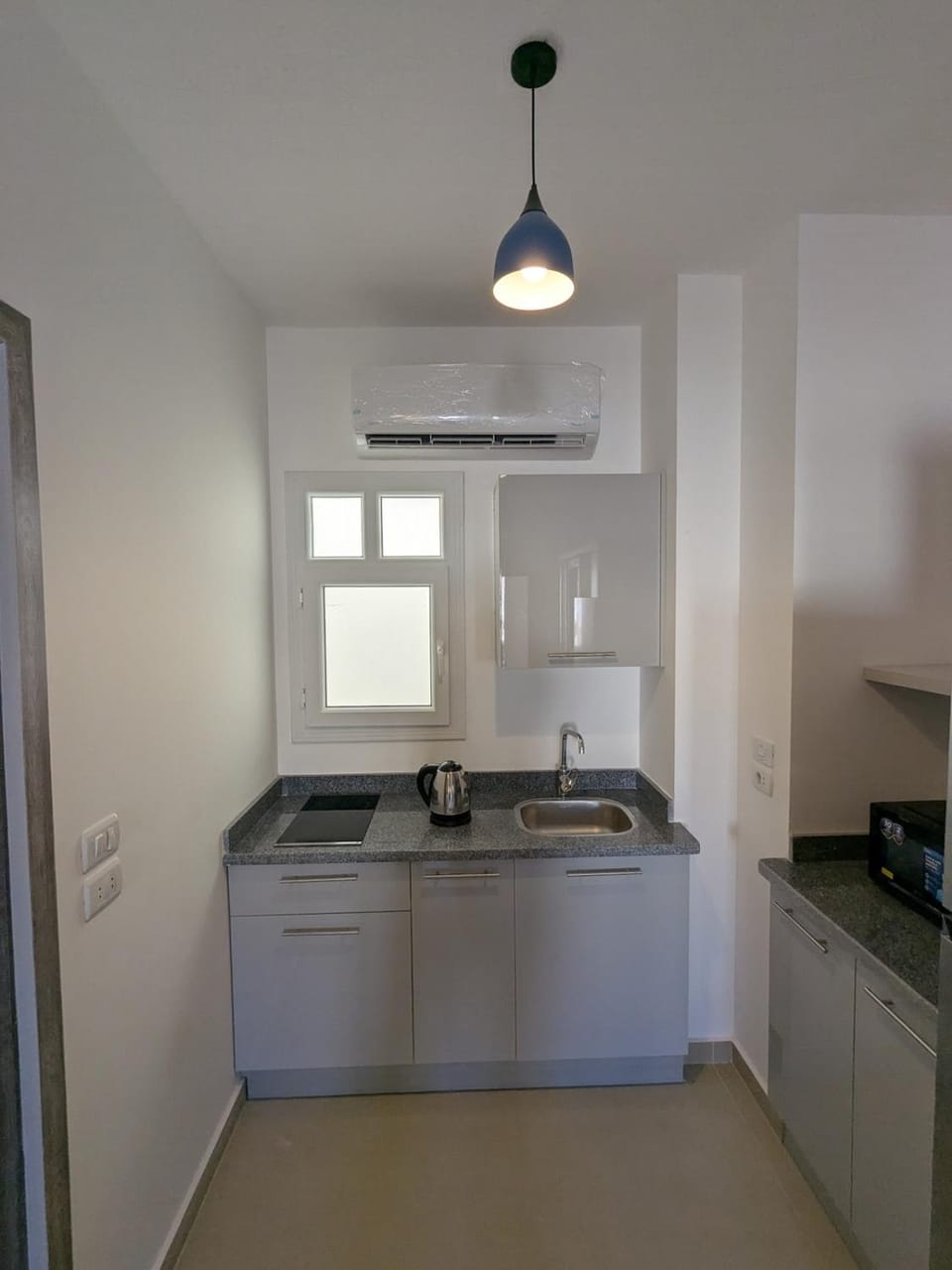 Kitchen or kitchenette, stove