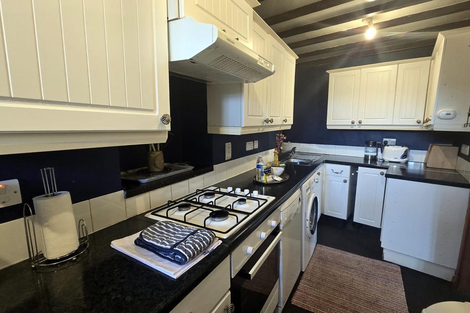 Kitchen or kitchenette, oven, stove