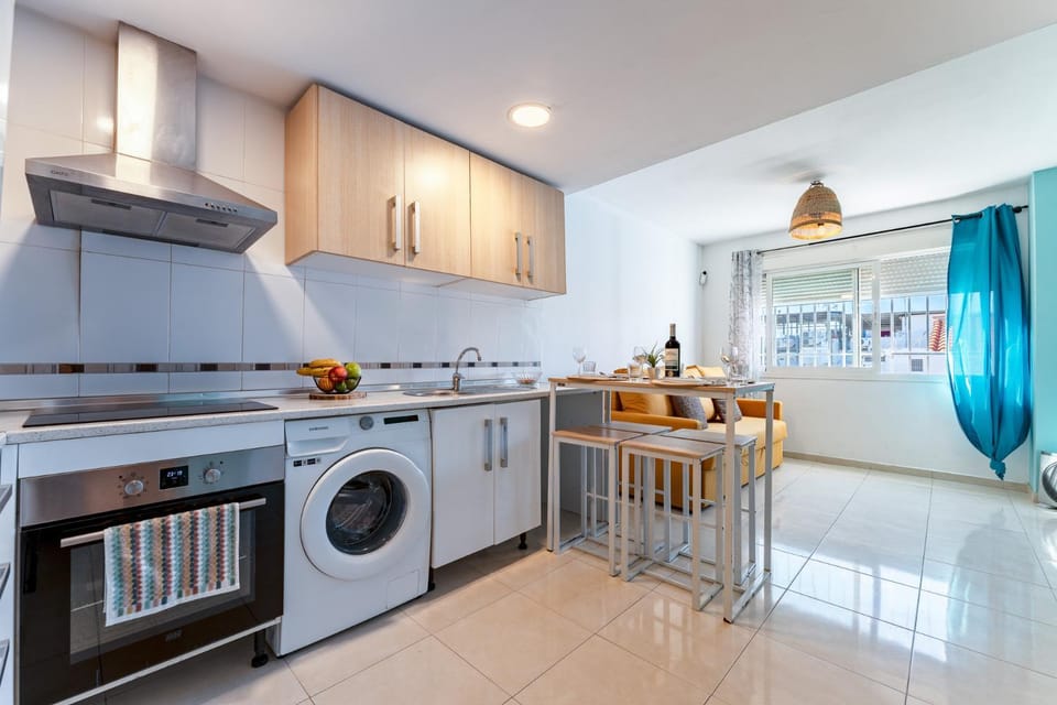 Kitchen or kitchenette, Dining area, oven, stove, toaster, washing machine