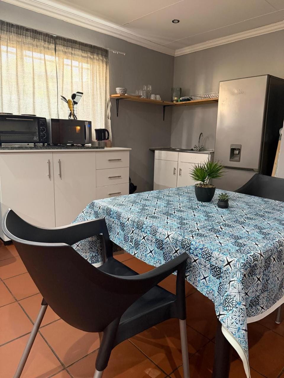 Dining area, microwave, oven, kitchen