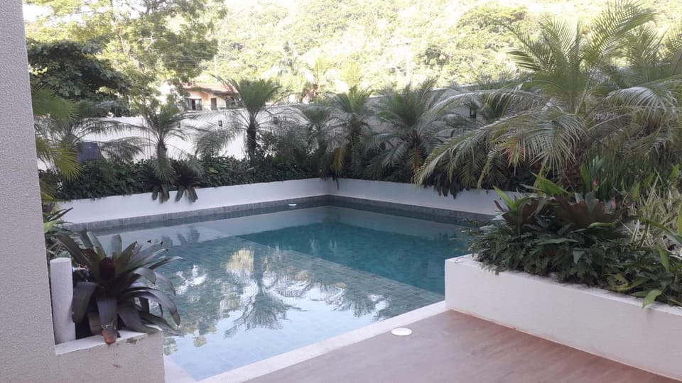 apartamento martim de sá 2 dormitórios churrasqueira na varanda Pé na areia 43 B Wilson B Apartment in Caraguatatuba