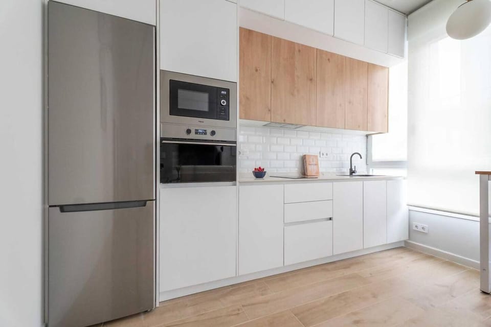 Kitchen or kitchenette, dishwasher, oven, stove, toaster