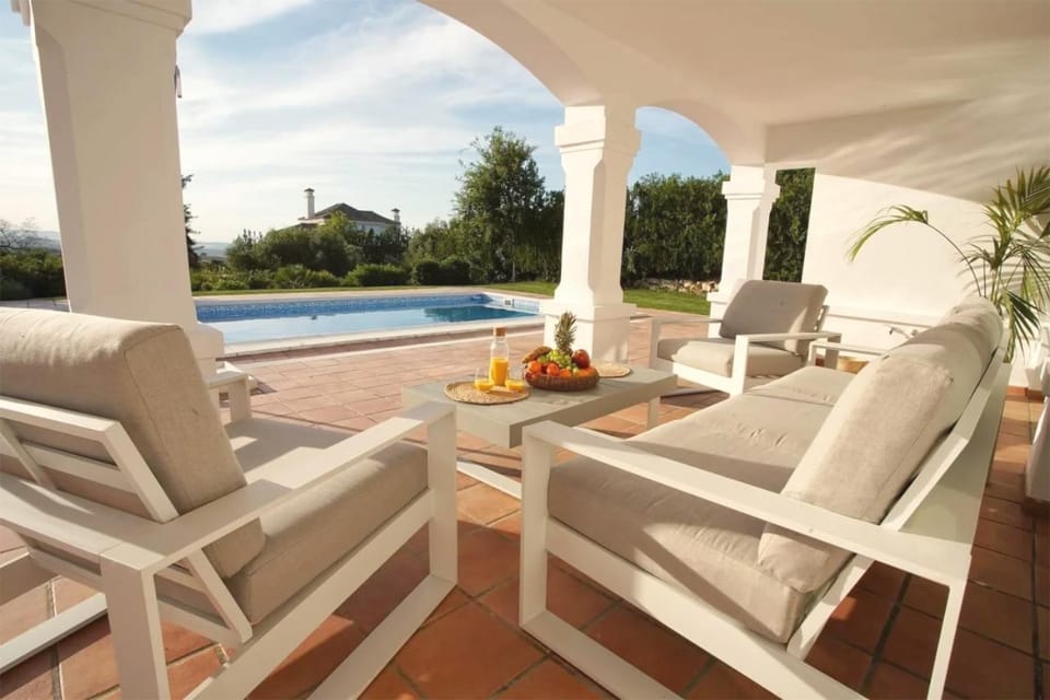 Patio, Natural landscape, Garden, View (from property/room), Dining area, Garden view, Pool view, Swimming pool, sunbed