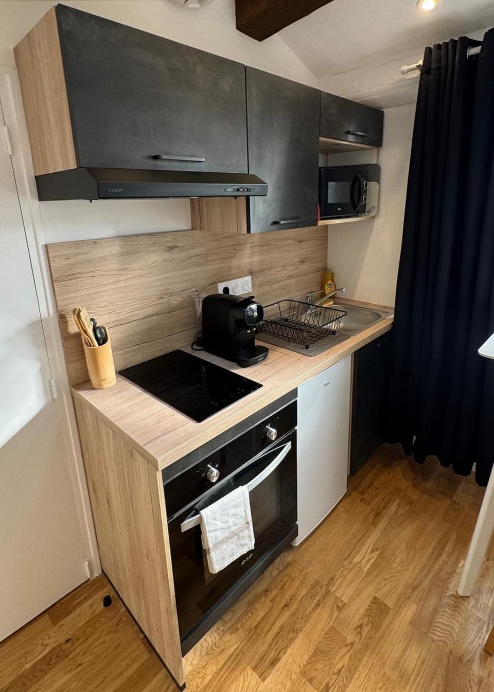 Kitchen or kitchenette, stove, toaster
