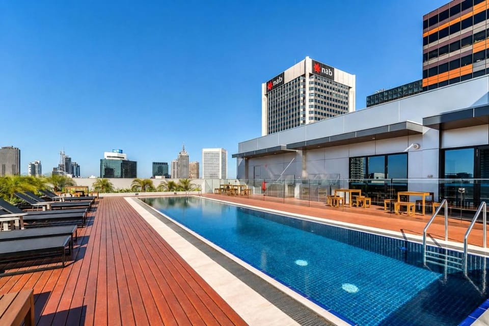 Property building, Day, Pool view, Swimming pool, sunbed