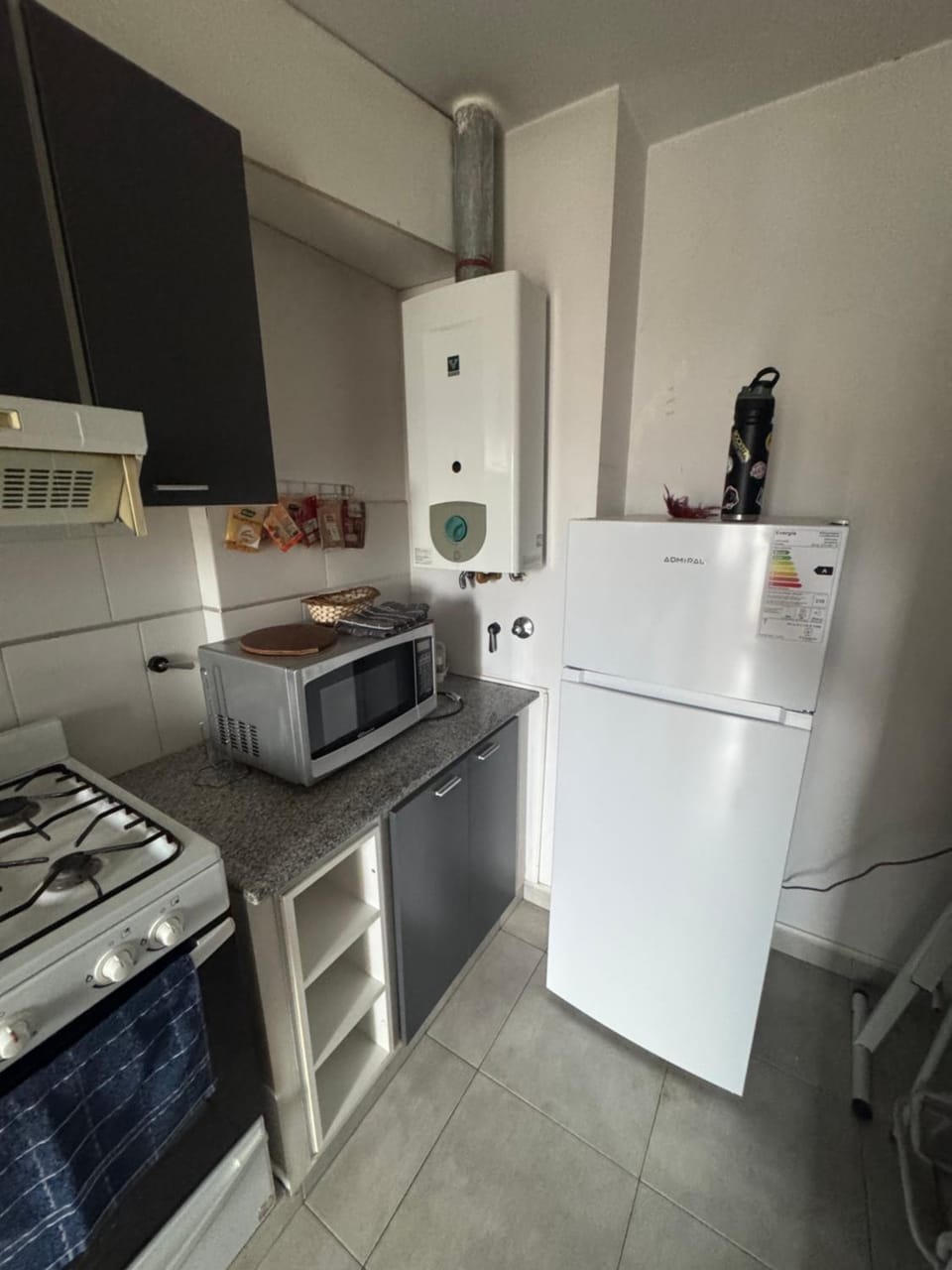 Kitchen or kitchenette, microwave