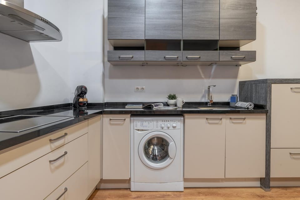 Kitchen or kitchenette, washing machine