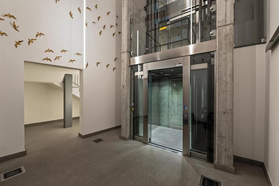 The Golden Duo Two luxury units in one building by Aura Luxury Collection Apartment in Como