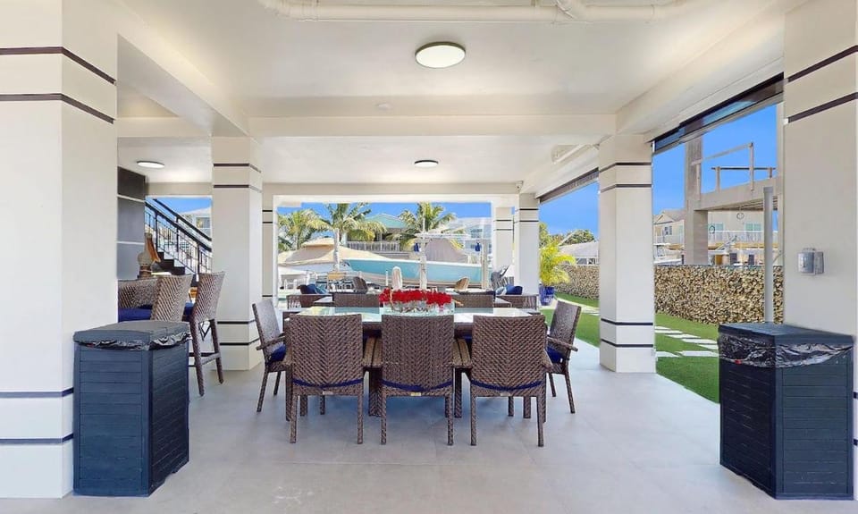 Patio, Seating area, Dining area, Pool view