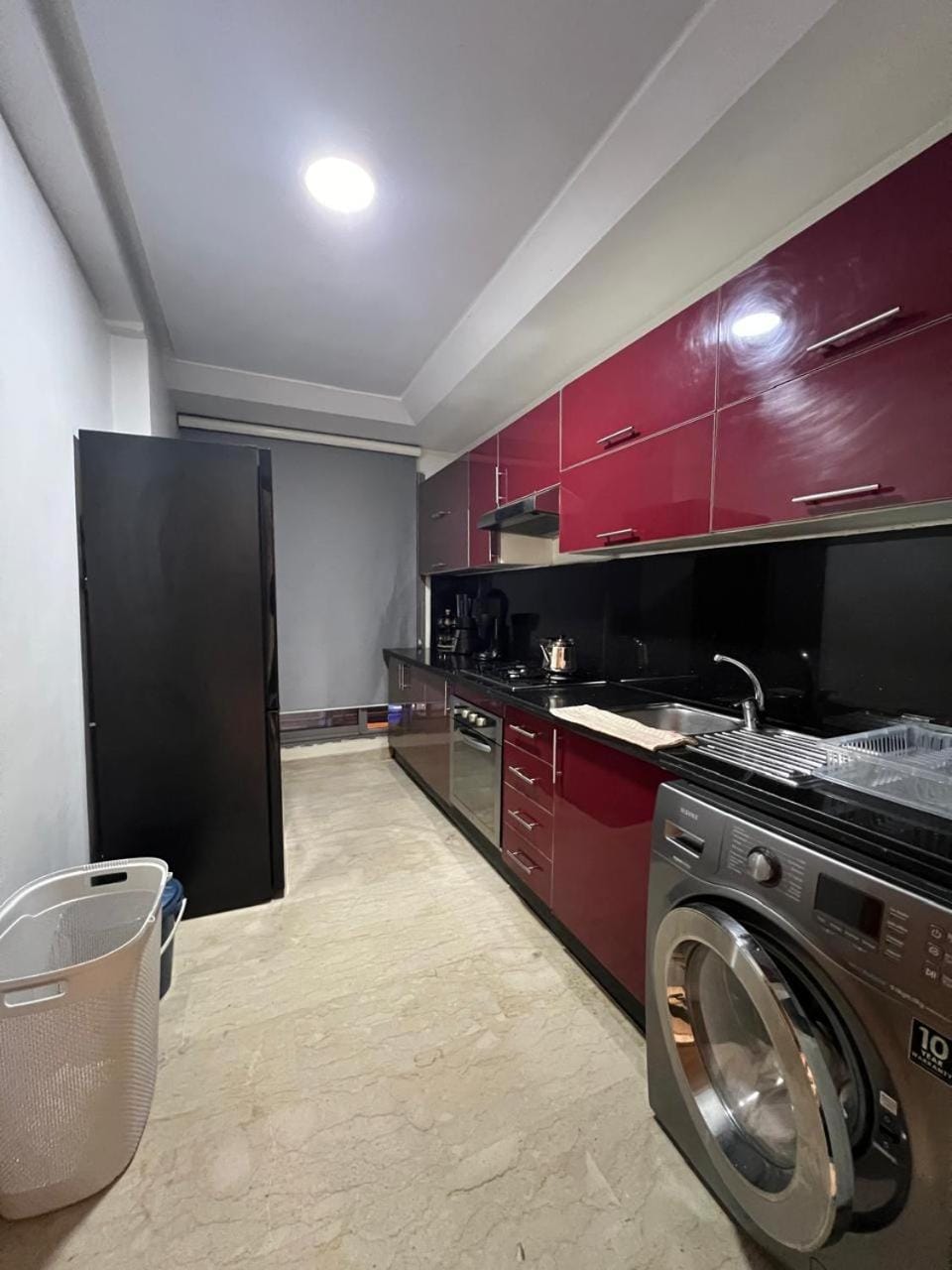 Kitchen or kitchenette, stove, washing machine