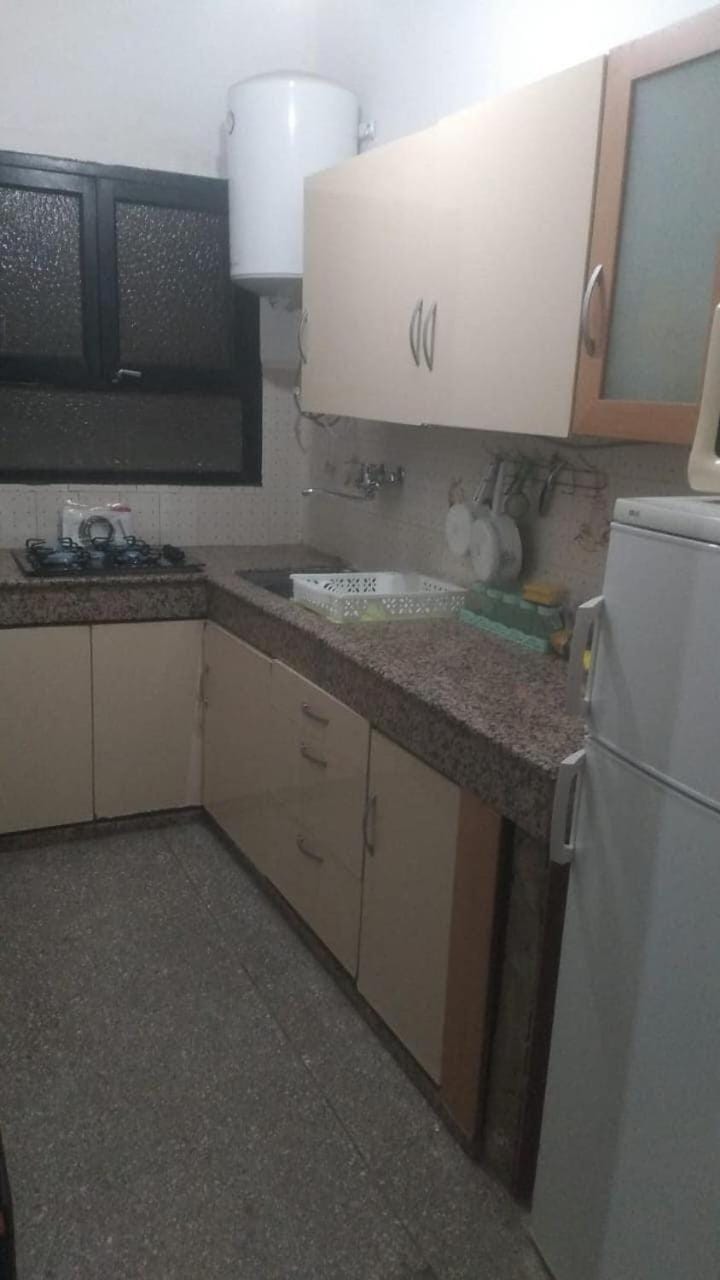 Kitchen or kitchenette, oven, stove