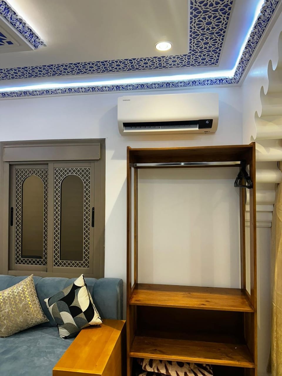 Bed, Seating area, Bedroom, wardrobe, air conditioner