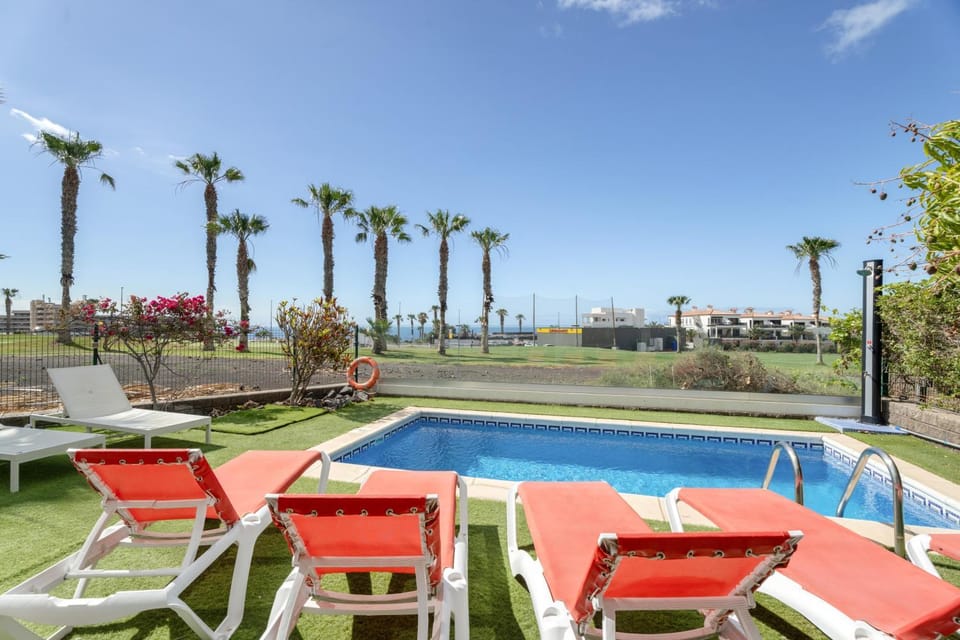 Property building, Living room, Swimming pool