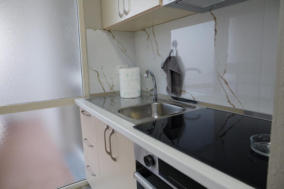 Kitchen or kitchenette, stove