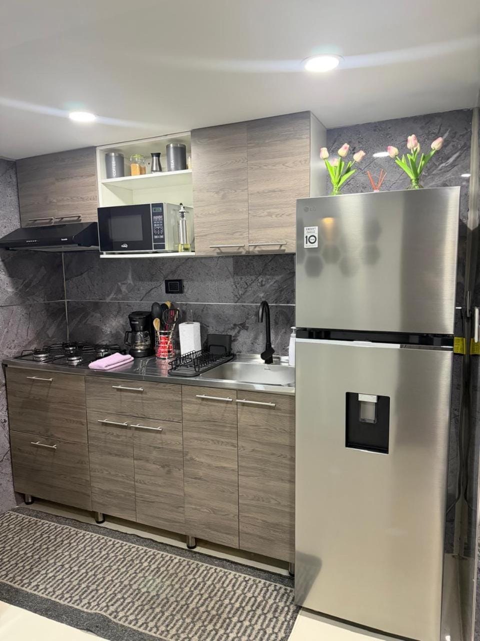 Kitchen or kitchenette, oven, stove