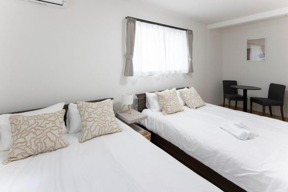 Bed, Seating area, Bedroom, towels, air conditioner