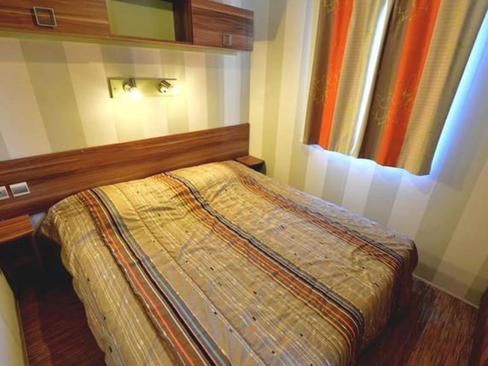 Mobil-home avec Terrasse, 3 Chambres, 4 Personnes - API-1-52-1131 Campground/ 
RV Resort in Occitanie