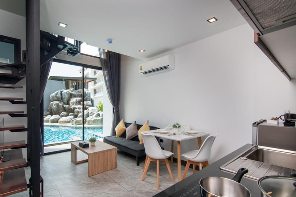 Living room, Dining area, Pool view