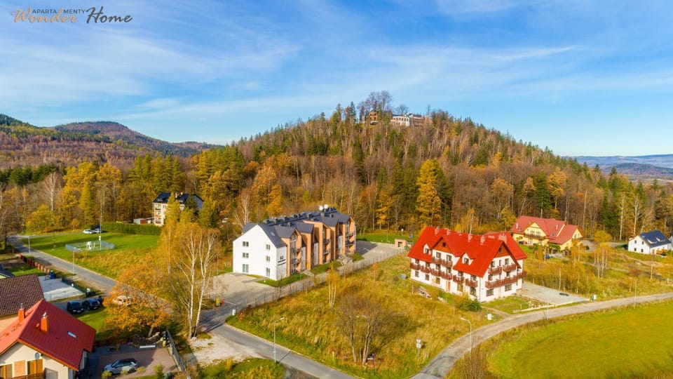 Property building, Nearby landmark, Spring, Day, Neighbourhood, Natural landscape, Bird's eye view, Mountain view