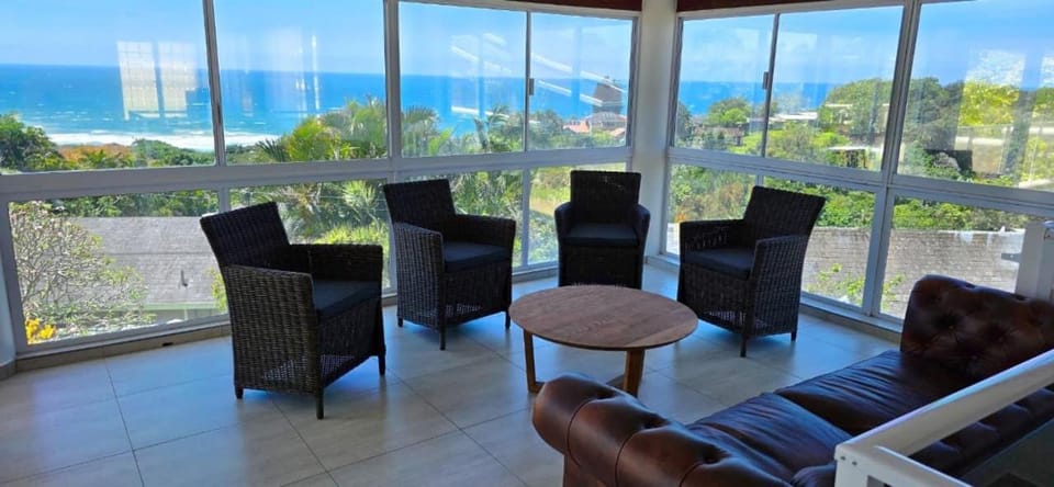 View (from property/room), Living room, Seating area, Sea view