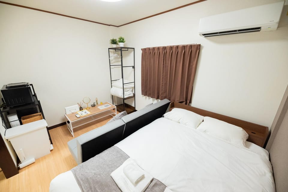 Bed, Photo of the whole room, Bedroom, towels, air conditioner