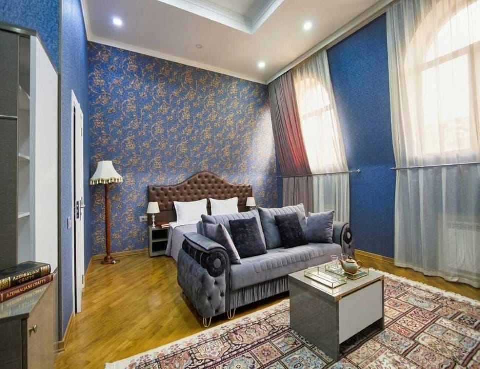 Bed, Seating area, Bedroom