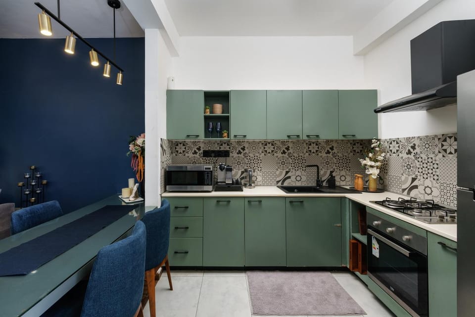 Kitchen or kitchenette, oven, air conditioner
