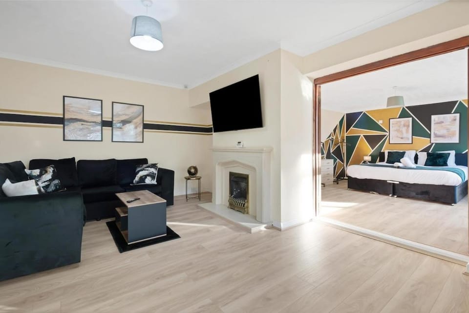 Bed, TV and multimedia, Living room, Decorative detail, Bedroom, fireplace, towels