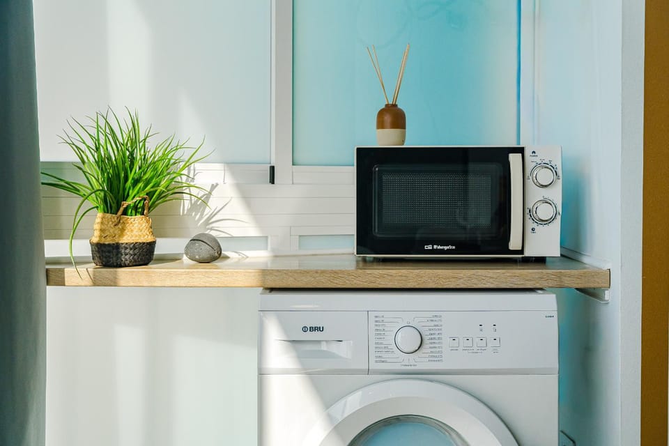 Kitchen or kitchenette, washing machine