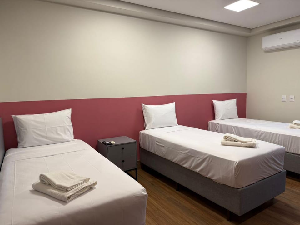 Bed, Photo of the whole room, towels, air conditioner
