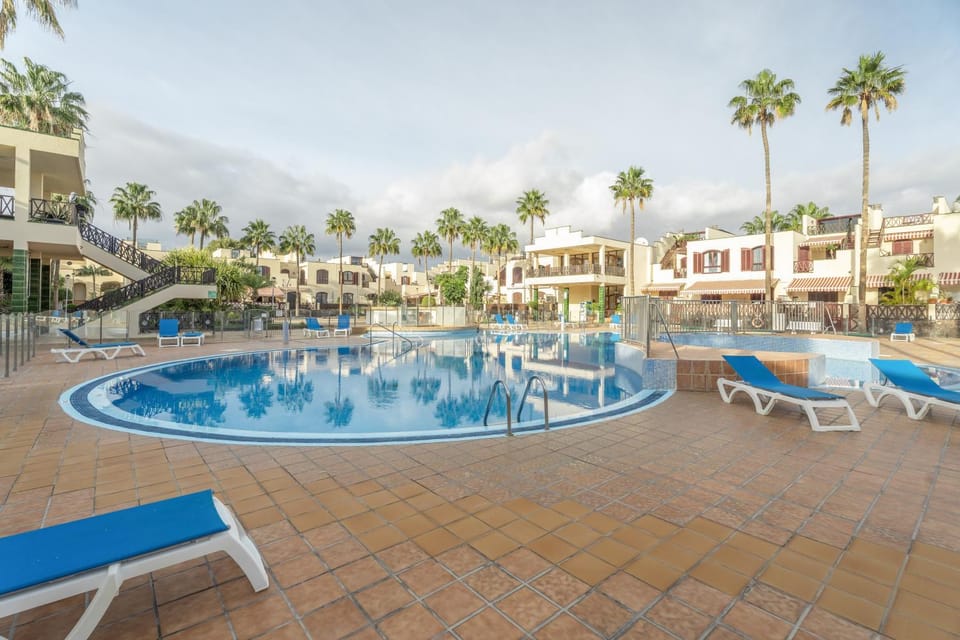 Property building, Living room, Swimming pool