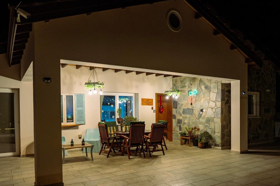 Patio, Facade/entrance, Night, Balcony/Terrace, Living room, Seating area, Dining area, Evening entertainment