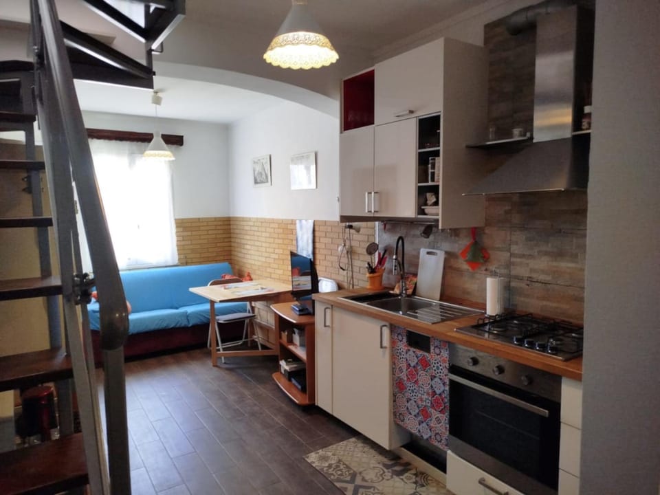 Kitchen or kitchenette, Living room, Seating area, Dining area, dishwasher, oven, stove, toaster