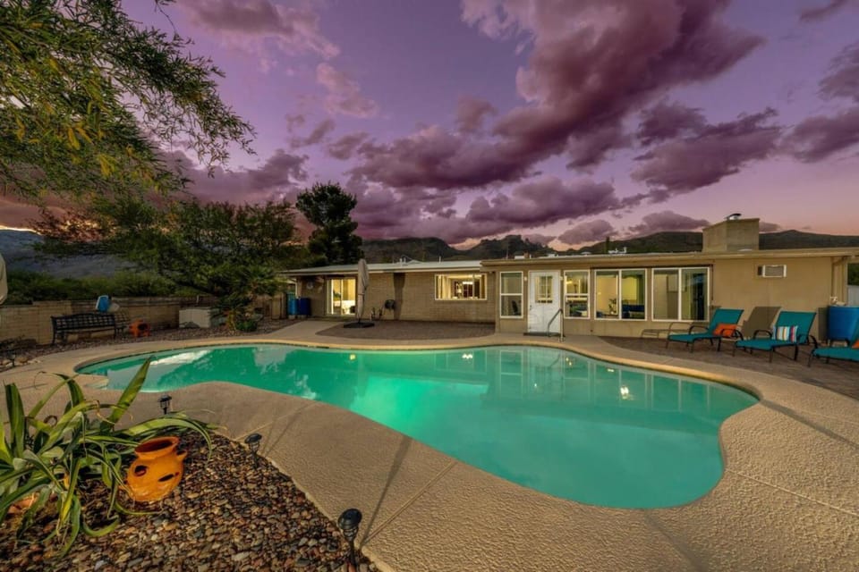 Property building, Patio, Day, Natural landscape, Pool view, Swimming pool, sunbed